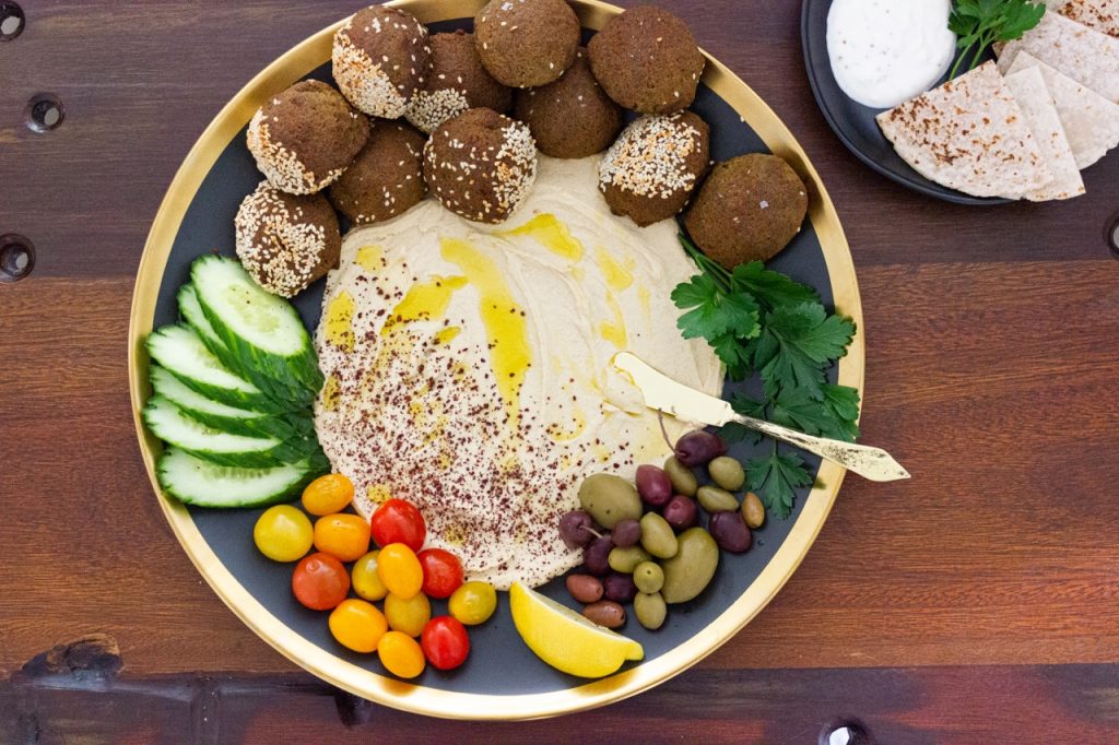 Homemade sSoft and Delicious Authentic Falafel with homemade hummus and garlic sauce