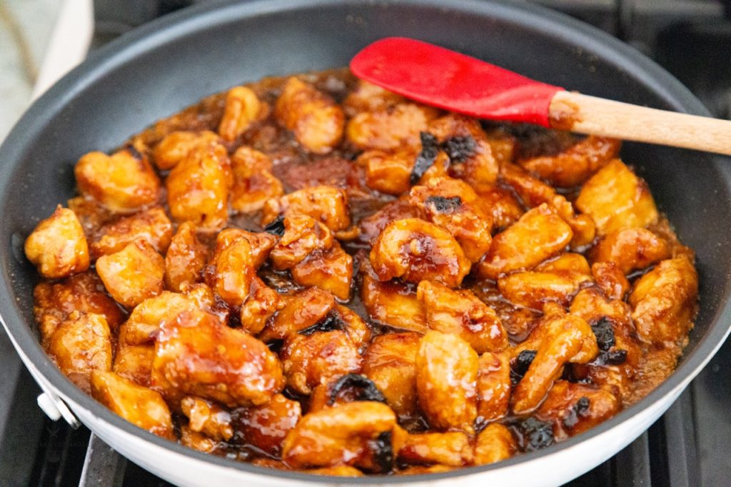 Fried Chicken marinating in orange sauce