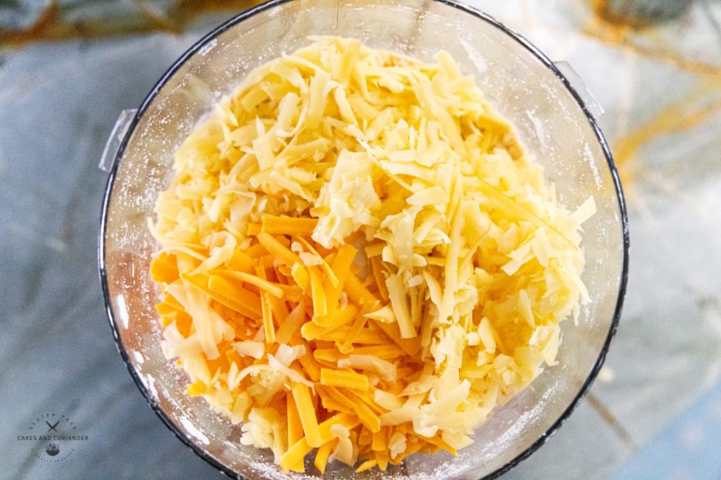 cheese and ingredients in a food processor